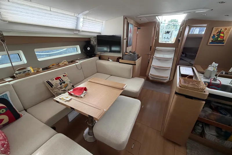 Slide: The Image of Interior of 2020 Jeanneau Sun Odyssey 490 yacht with cozy seating and modern amenities. - 17