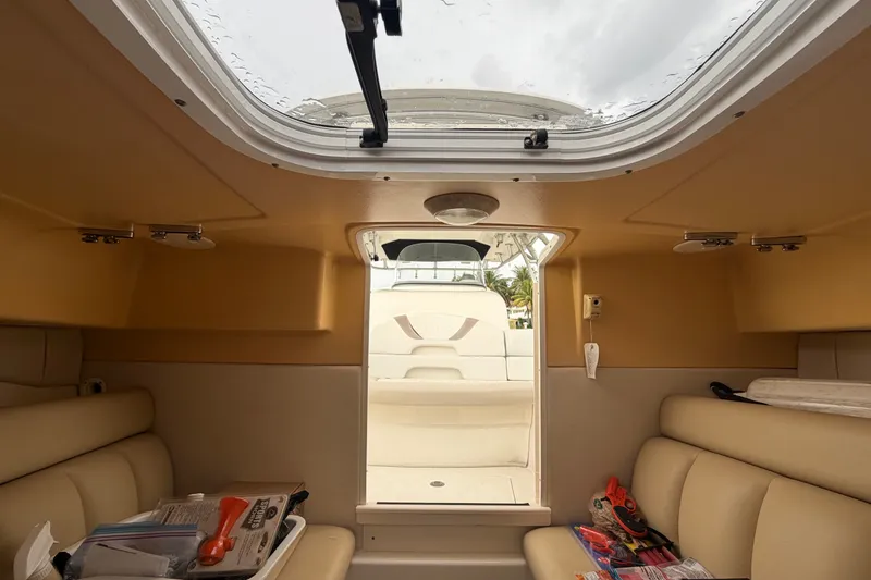 Slide: The Image of Interior cabin view of a 2007 Boston Whaler 320 Outrage boat. - 55