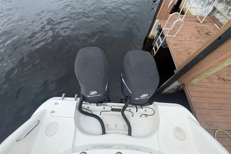 Slide: The Image of 2007 Boston Whaler 320 Outrage with twin Mercury engines at dockside. - 57
