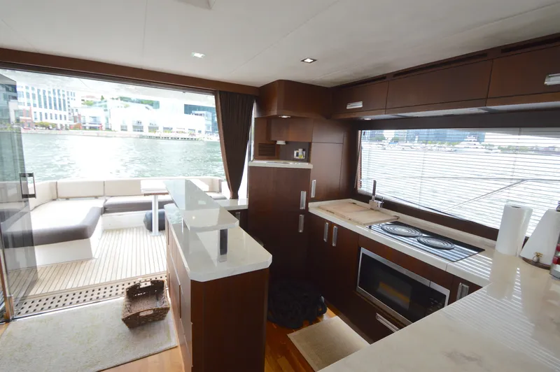 Slide: The Image of Interior of a 2016 Galeon 550 Fly with modern kitchen and water view. - 27