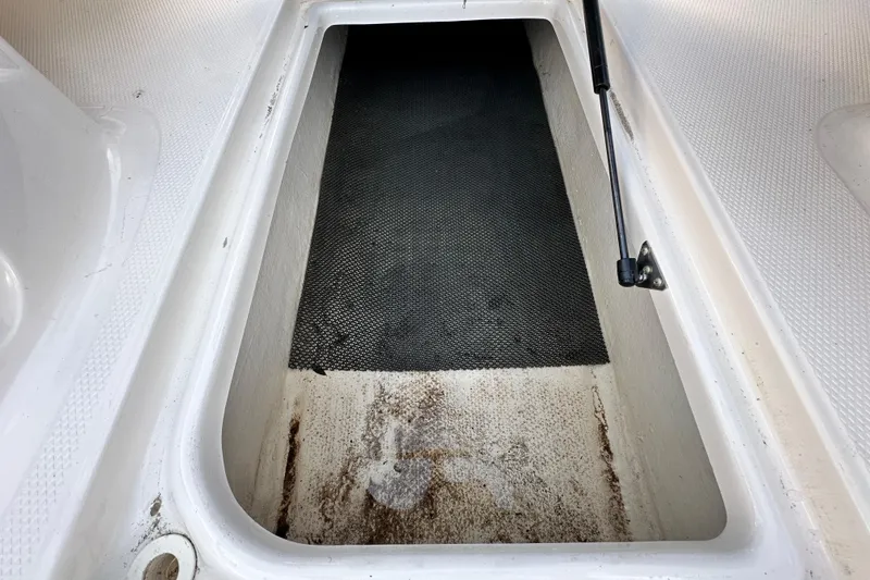 Slide: The Image of Storage compartment in 2017 Chaparral Vortex 203 VRX boat, featuring a hydraulic lift. - 69