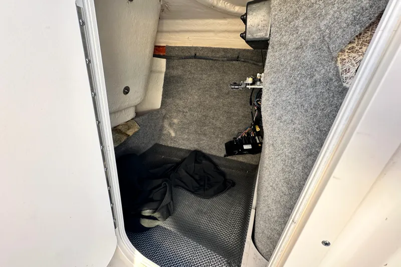 Slide: The Image of Interior view of 2017 Chaparral Vortex 203 VRX boat storage compartment. - 77