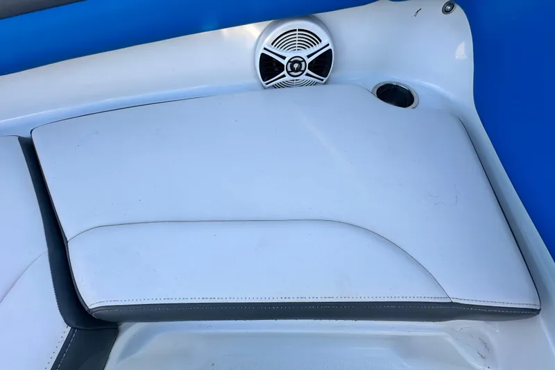 Slide: The Image of 2017 Chaparral Vortex 203 VRX boat interior with speaker and cushioned seating. - 85