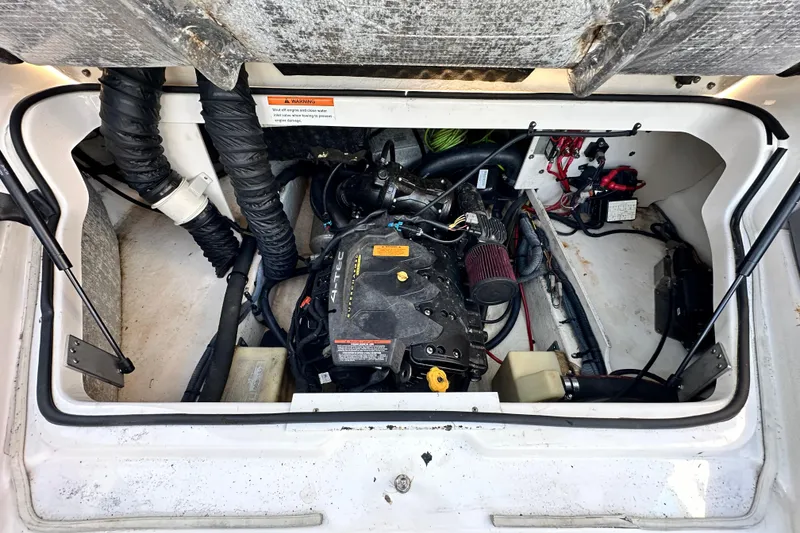 Slide: The Image of Engine compartment of 2017 Chaparral Vortex 203 VRX boat, showing detailed components. - 54