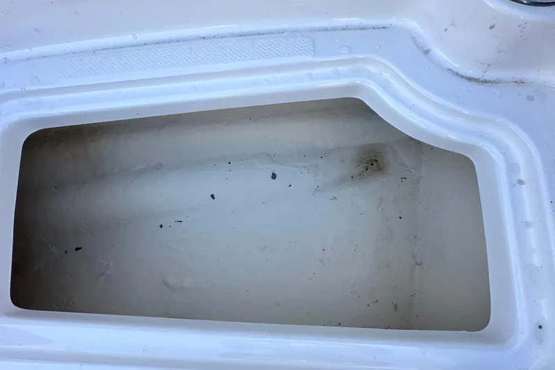 Slide: The Image of Storage compartment of a 2017 Chaparral Vortex 203 VRX boat, showing interior details. - 87