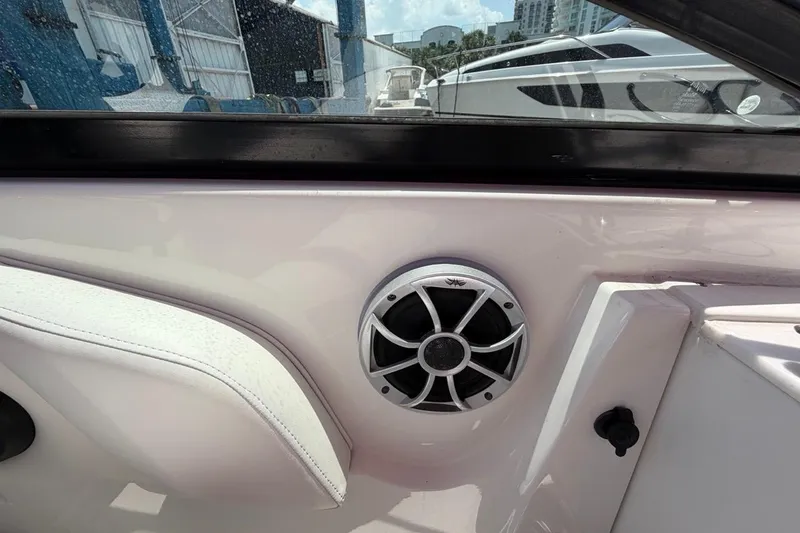 Slide: The Image of Interior of 2017 Monterey M-65 boat with speaker and window view. - 79