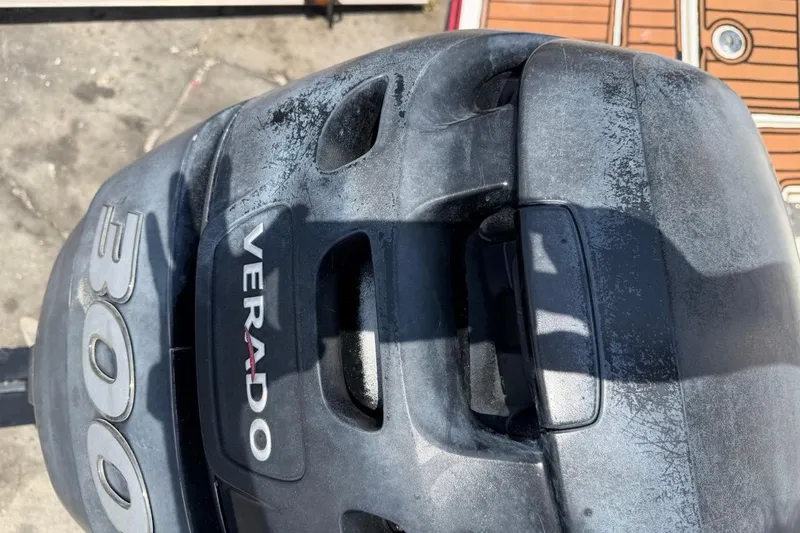 Slide: The Image of Outboard motor with "Verado 300" branding on a Monterey M-65, 2017 model. - 117
