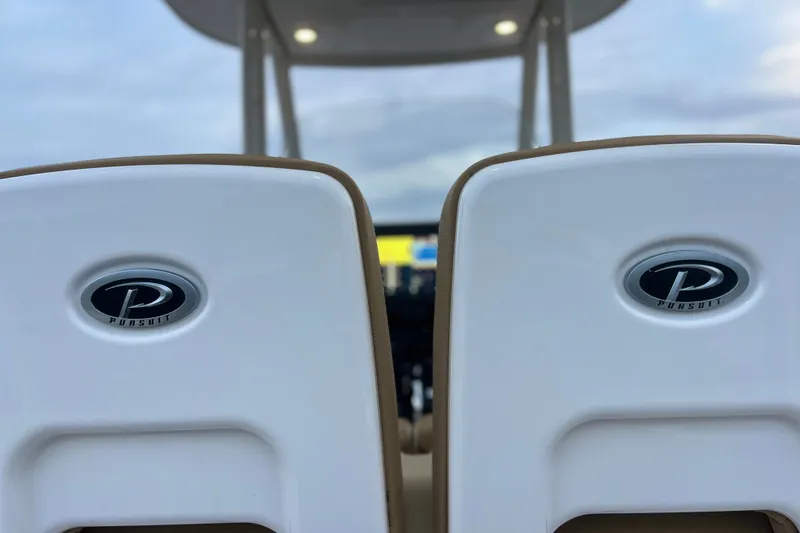 Slide: The Image of 2017 Pursuit C 238 Center Console boat seats with logo, showcasing luxury design. - 75