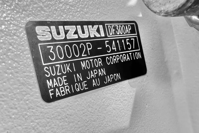 Slide: The Image of Suzuki DF300AP engine label on 2017 Pursuit C 238 Center Console boat. - 8