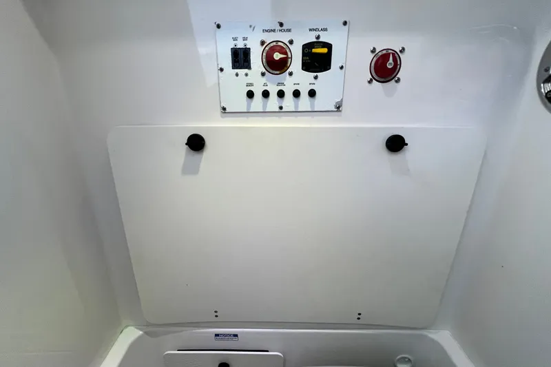 Slide: The Image of Control panel of a 2017 Pursuit C 238 Center Console boat. - 93