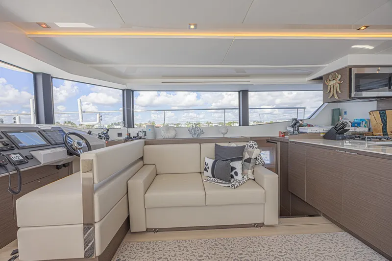 Slide: The Image of Luxurious interior of 2025 Leopard 53 Powercat yacht with modern furnishings and panoramic windows. - 37