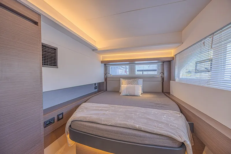 Slide: The Image of Luxurious bedroom interior of 2025 Leopard 53 Powercat yacht with modern design and ambient lighting. - 46