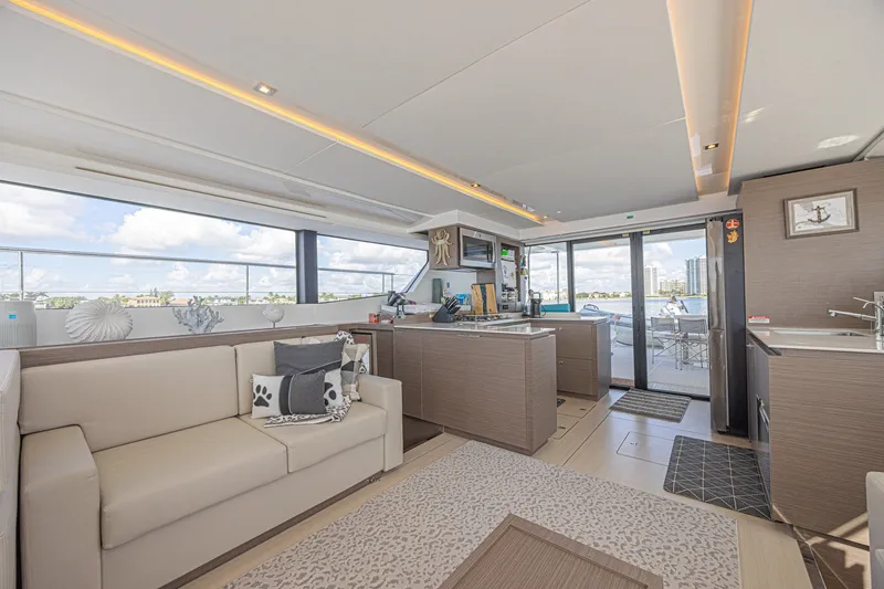 Slide: The Image of Luxurious interior of 2025 Leopard 53 Powercat yacht with modern kitchen and seating area. - 44