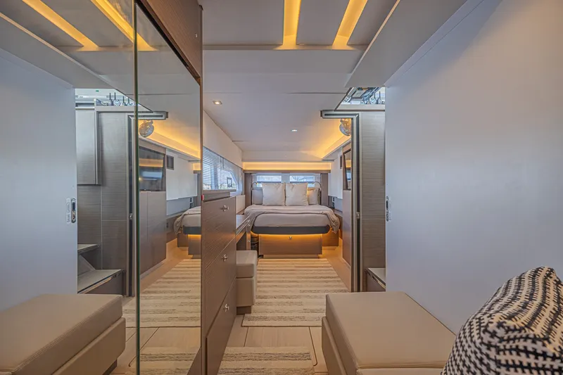 Slide: The Image of Luxurious interior of 2025 Leopard 53 Powercat yacht, featuring modern bedroom design and ambient lighting. - 57
