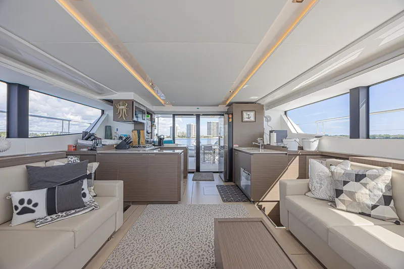 Slide: The Image of Luxurious interior of 2025 Leopard 53 Powercat yacht with modern design and panoramic windows. - 43