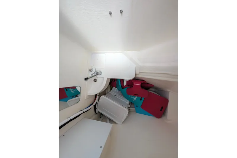 Slide: The Image of Interior storage space on 2025 Leopard 53 Powercat with sink and equipment. - 67