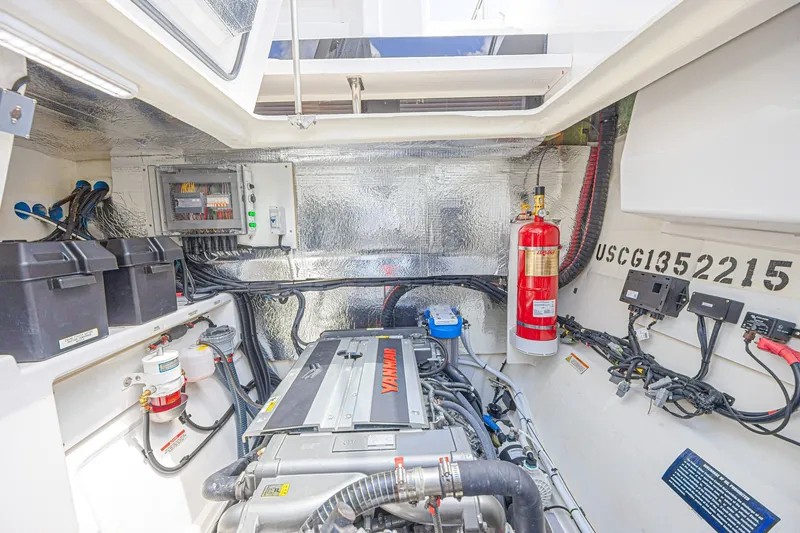 Slide: The Image of Engine room of 2025 Leopard 53 Powercat with Yanmar engine and safety equipment. - 70
