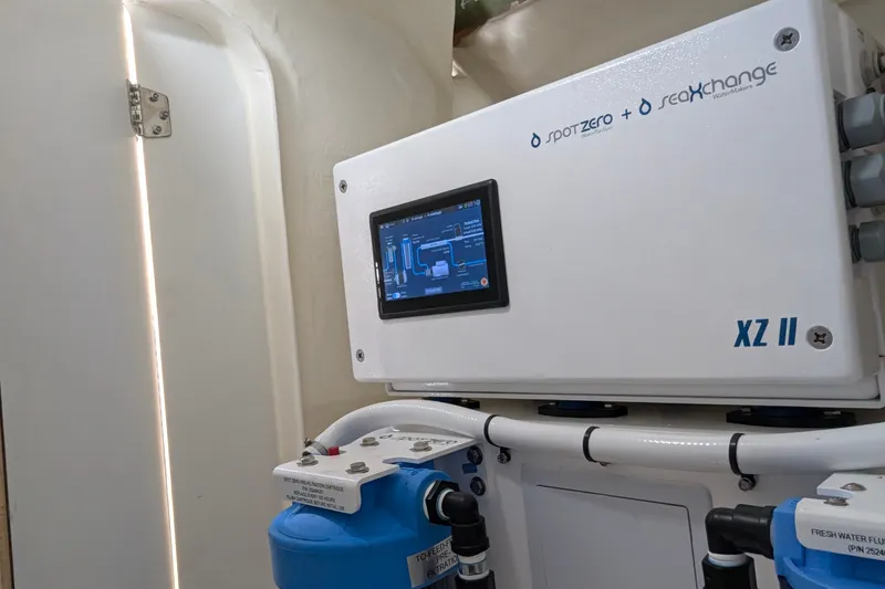 Slide: The Image of Watermaker system on 2025 Leopard 53 Powercat, featuring Spot Zero and SeaXchange technology. - 75