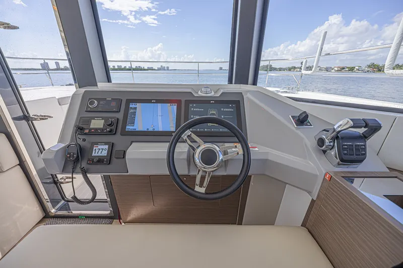 Slide: The Image of Helm of 2025 Leopard 53 Powercat with modern navigation and control systems. - 40