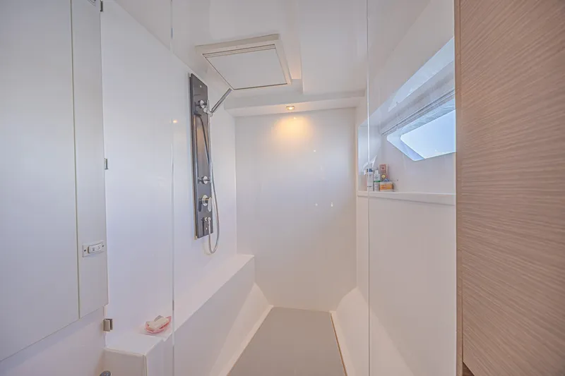 Slide: The Image of Modern bathroom interior on 2025 Leopard 53 Powercat yacht, featuring sleek shower design. - 60