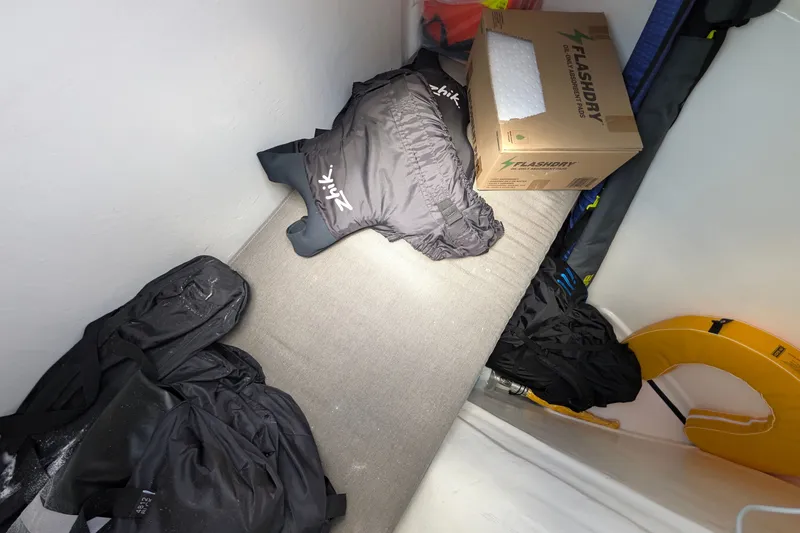 Slide: The Image of Storage area on Leopard 53 Powercat 2025 with gear and FlashDry box. - 66