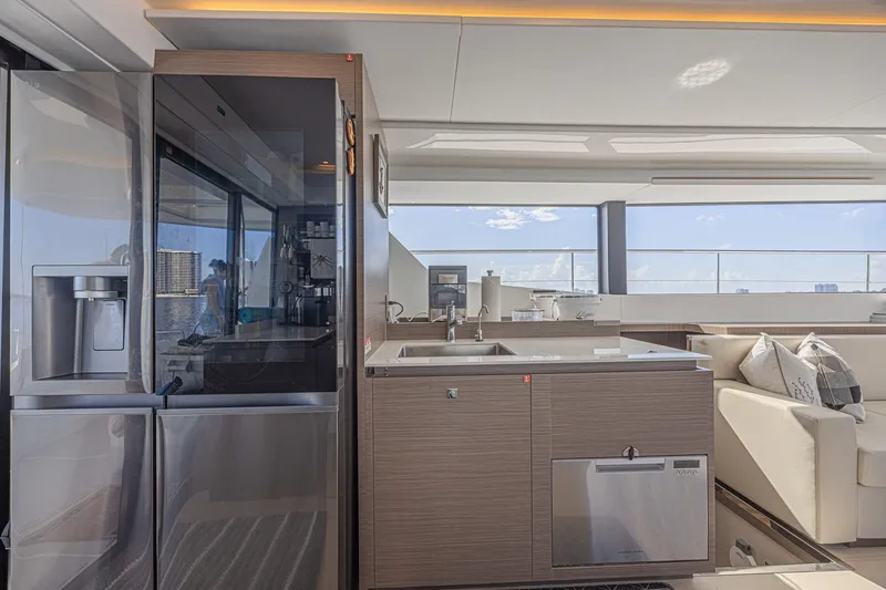 Slide: The Image of Modern kitchen interior on 2025 Leopard 53 Powercat yacht, featuring sleek appliances and elegant design. - 35