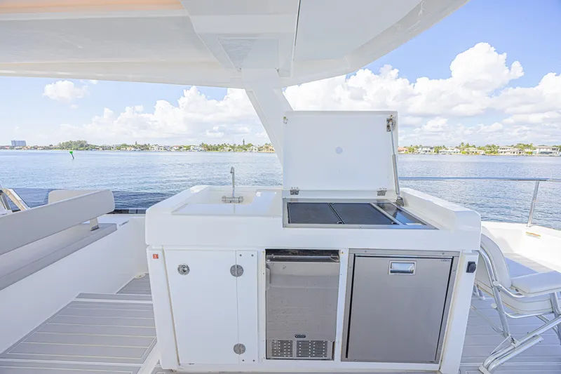Slide: The Image of Outdoor kitchen on 2025 Leopard 53 Powercat yacht with ocean view. - 33