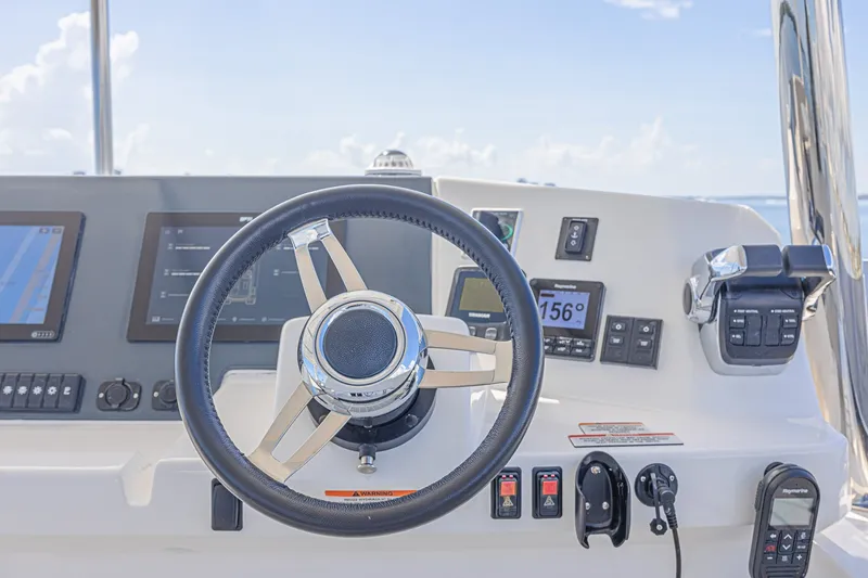 Slide: The Image of Steering console of 2025 Leopard 53 Powercat with modern navigation equipment. - 31