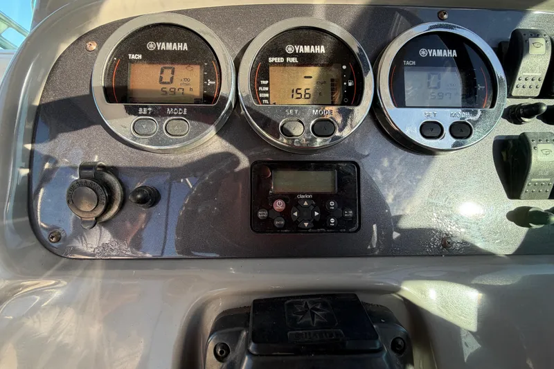 Slide: The Image of Dashboard of 2017 Robalo R265 Walkaround with Yamaha gauges and controls. - 30