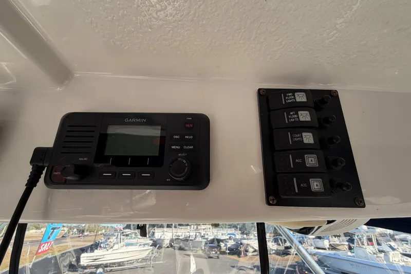 Slide: The Image of Garmin marine radio and control panel on 2017 Robalo R265 Walkaround boat. - 35