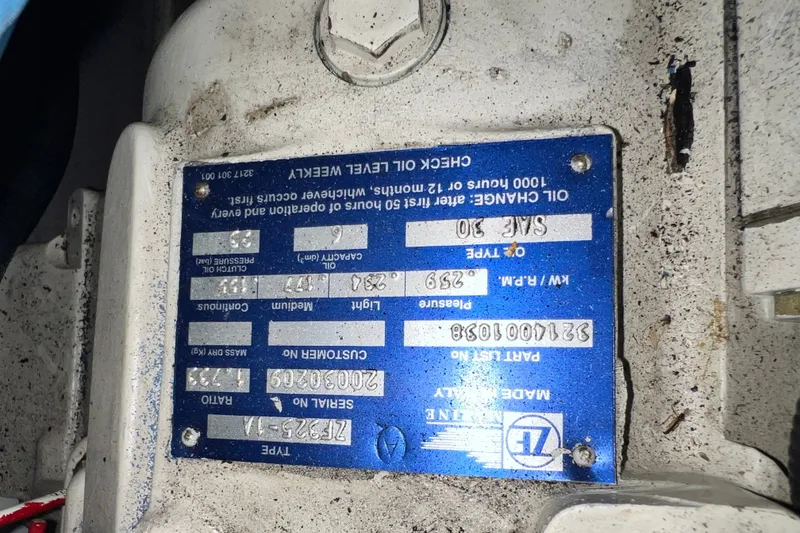 Slide: The Image of Close-up of a Sea Ray 480 Motor Yacht 2003 engine plate with specifications. - 42