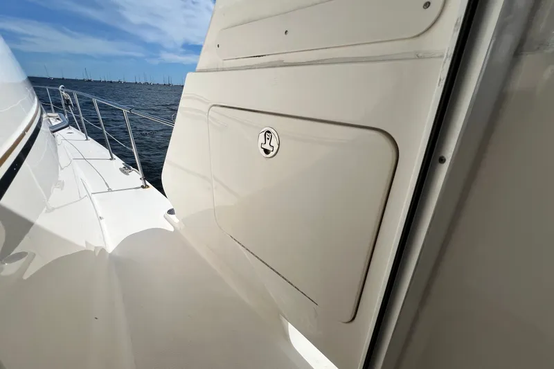 Slide: The Image of 2003 Sea Ray 480 Motor Yacht deck with ocean view and clear blue sky. - 187