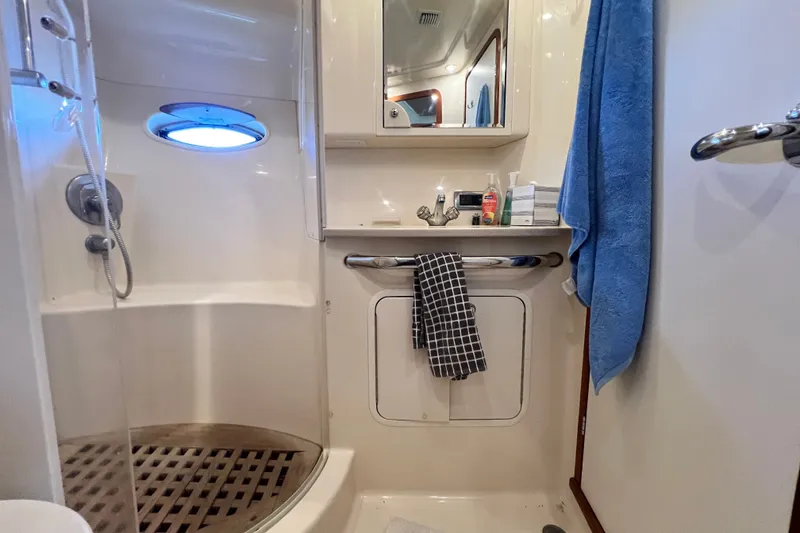 Slide: The Image of Bathroom interior of 2003 Sea Ray 480 Motor Yacht with shower and sink. - 115