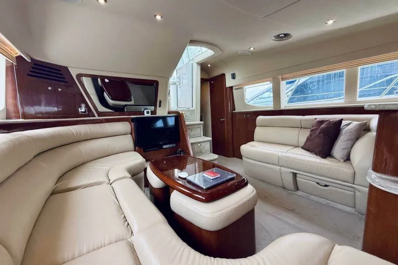 Slide: The Image of Luxurious interior of a 2003 Sea Ray 480 Motor Yacht with plush seating and elegant design. - 19