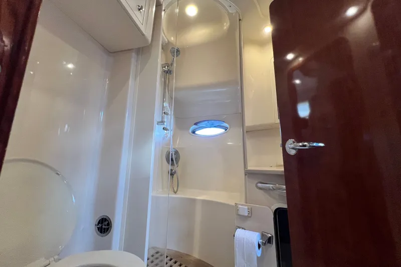Slide: The Image of Bathroom interior of 2003 Sea Ray 480 Motor Yacht with shower and toilet. - 113
