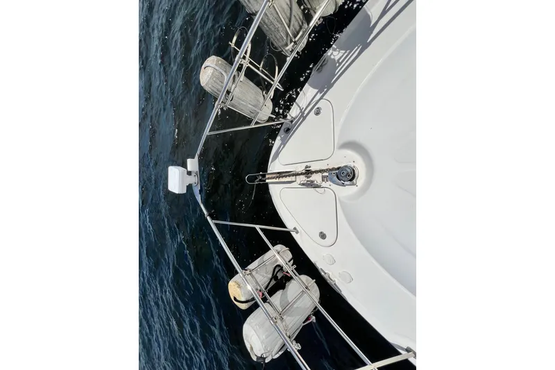 Slide: The Image of Top view of 2003 Sea Ray 480 Motor Yacht's bow with fenders and railing. - 64