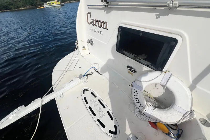 Slide: The Image of 2003 Sea Ray 480 Motor Yacht deck with lifebuoy, docked in Palm Coast, FL. - 196