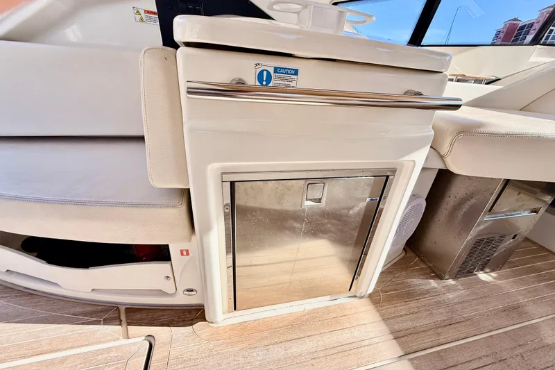 Slide: The Image of Interior of 2016 Cranchi M44 HT yacht with sleek cabinetry and wood flooring. - 19