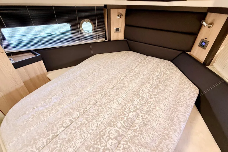 Slide: The Image of Luxurious bedroom interior of 2016 Cranchi M44 HT yacht with elegant bedding and modern design. - 102