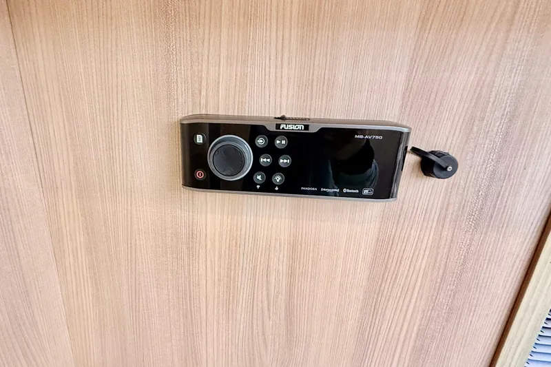 Slide: The Image of Fusion MS-AV750 audio system on 2016 Cranchi M44 HT yacht interior. - 88