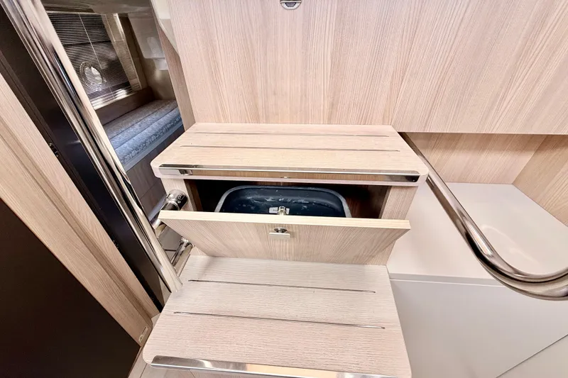 Slide: The Image of Interior of 2016 Cranchi M44 HT yacht with wooden cabinetry and modern design. - 69