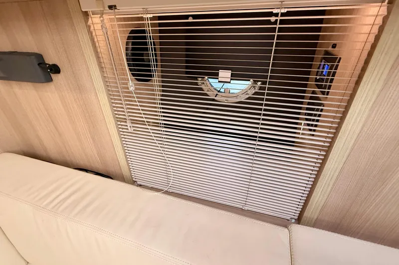 Slide: The Image of Interior of 2016 Cranchi M44 HT yacht with blinds and porthole. - 89