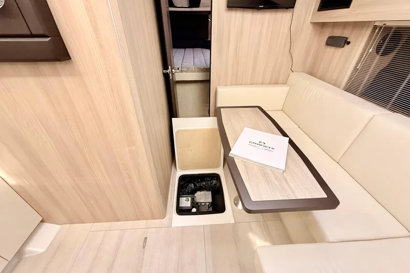 Slide: The Image of Interior of 2016 Cranchi M44 HT yacht with seating and storage compartment. - 72
