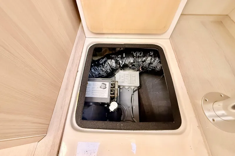 Slide: The Image of Engine compartment of 2016 Cranchi M44 HT yacht, showcasing internal components. - 73