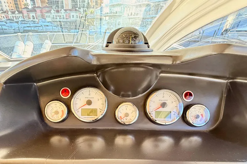 Slide: The Image of Dashboard of 2016 Cranchi M44 HT yacht with gauges and compass. - 37