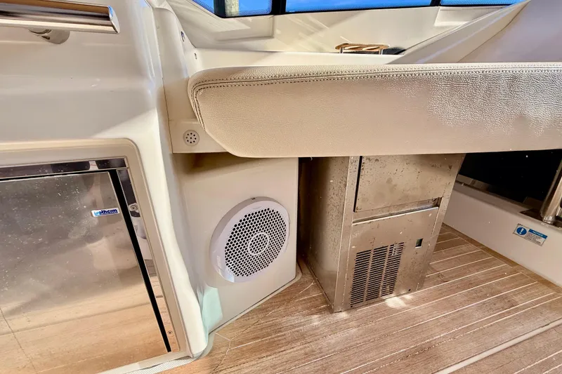 Slide: The Image of Interior of 2016 Cranchi M44 HT yacht with speaker and stainless steel appliance. - 21