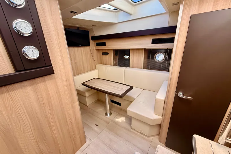 Slide: The Image of Interior of 2016 Cranchi M44 HT yacht with cozy seating and modern decor. - 82