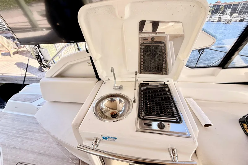 Slide: The Image of Outdoor kitchen on 2016 Cranchi M44 HT yacht with sink and grill. - 134