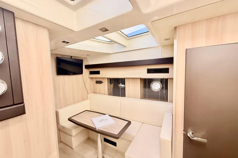 Slide: The Image of Interior of 2016 Cranchi M44 HT yacht with modern seating and skylight. - 80
