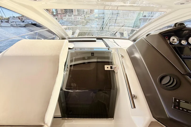 Slide: The Image of Interior view of 2016 Cranchi M44 HT yacht cockpit with modern controls. - 40